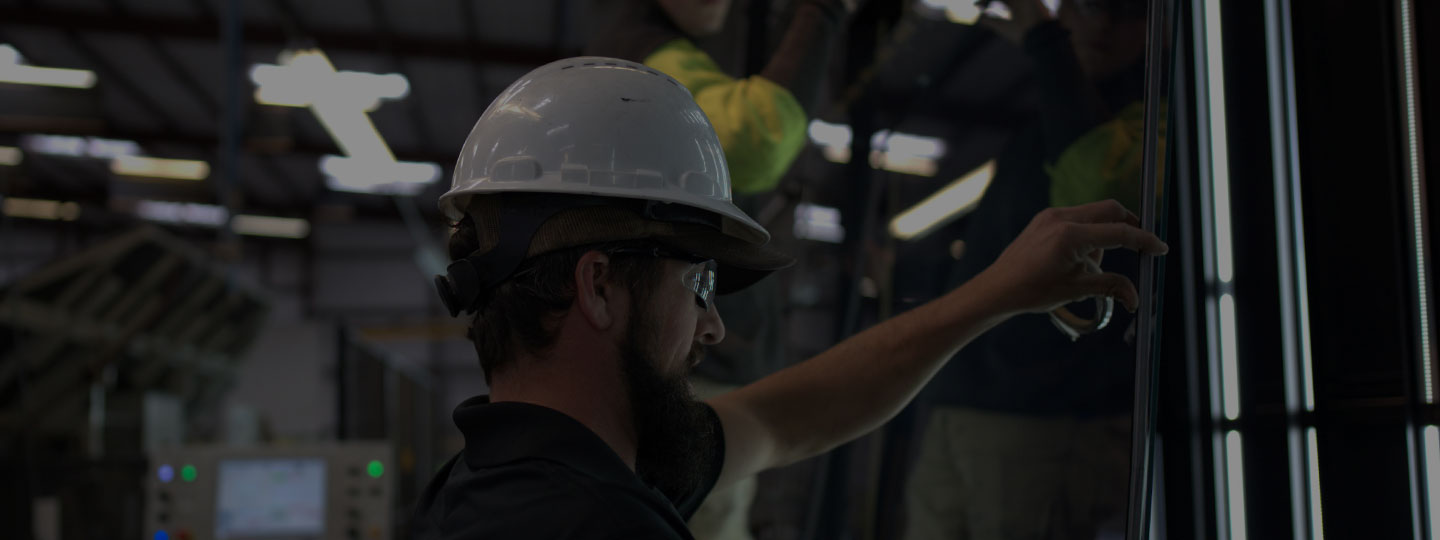 CLG team inspecting glass during production